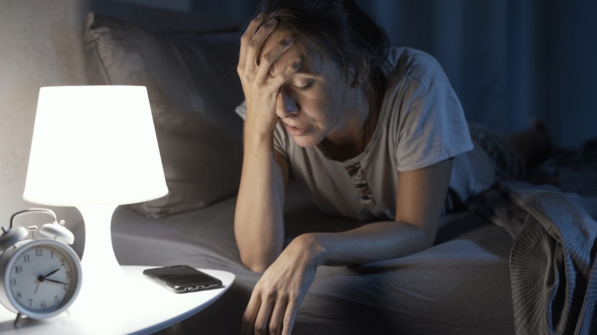 une femme désespérée souffrant d'insomnie